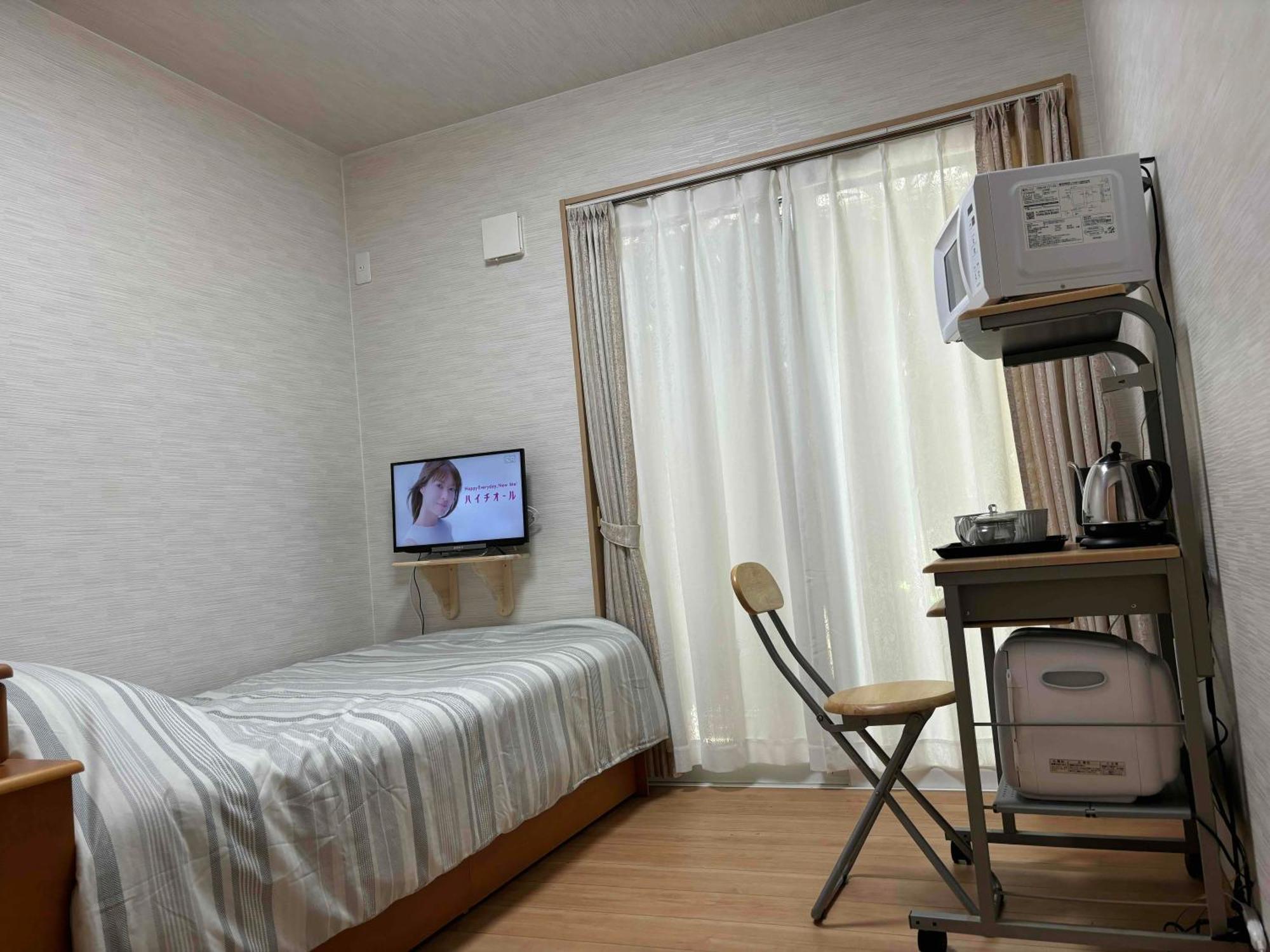 Guest House Harukawa Ōsaka Extérieur photo