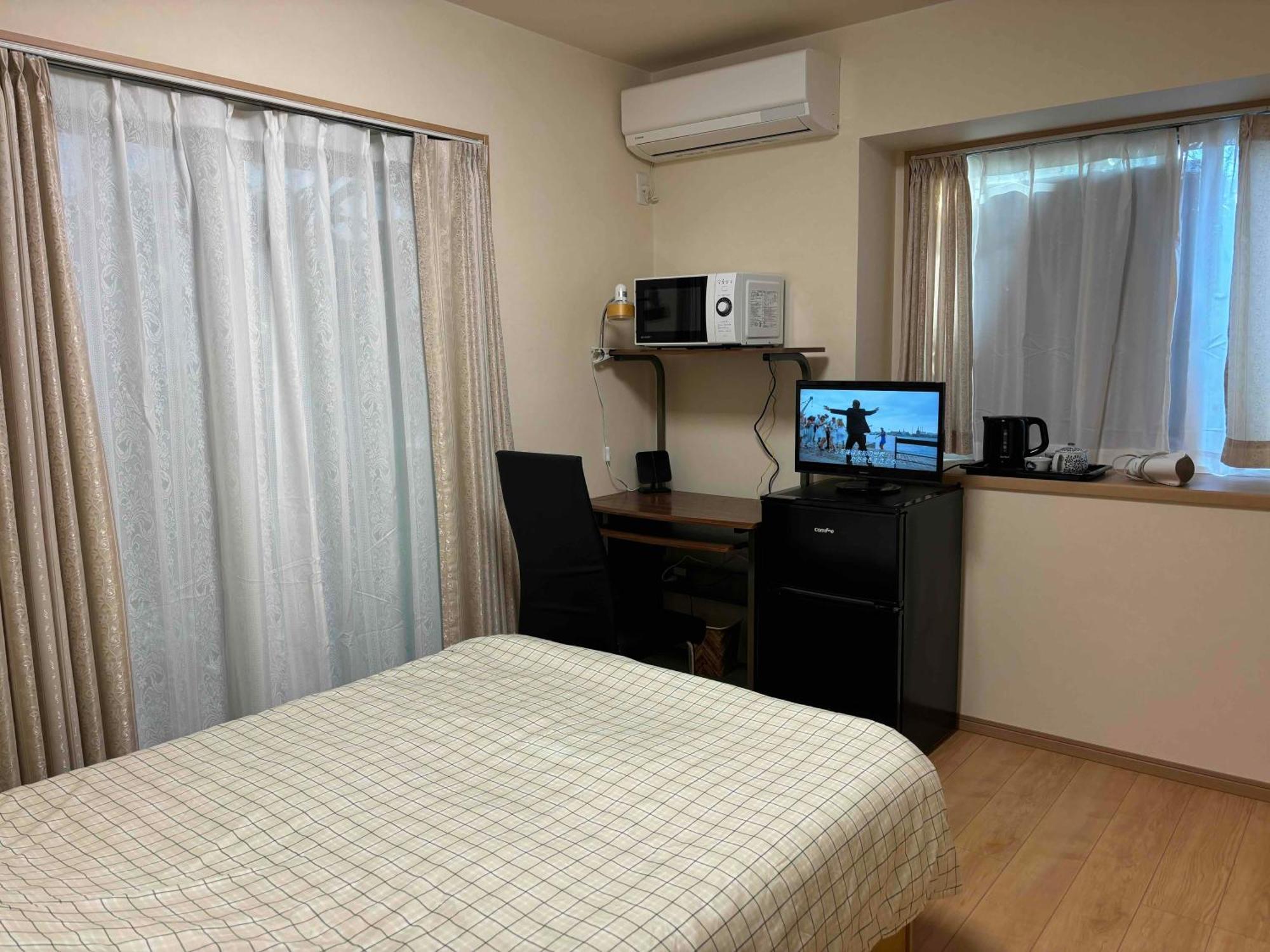 Guest House Harukawa Ōsaka Extérieur photo